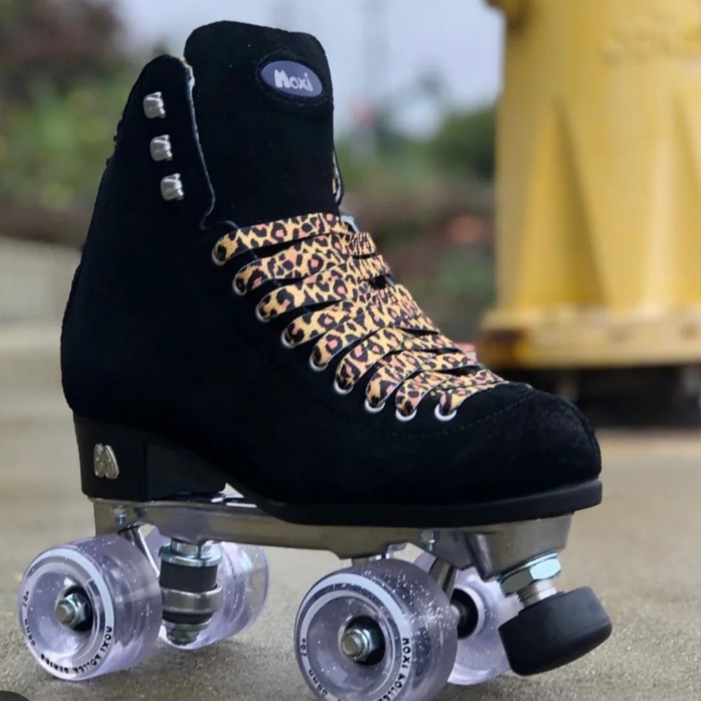 Moxi Black Roller Skates with Leopard Laces